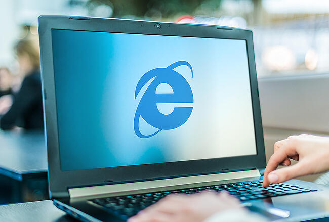Laptop with Internet Explorer icon showing on the screen.