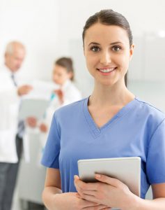 nurse smiling at camera